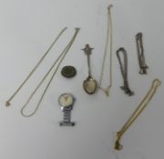 Small collection of yellow metal chains, jewellery, silver spoon and Smith's nurses watch.
