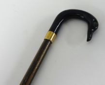 A child's walking stick, height 59cm.