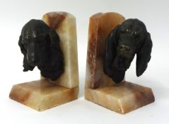 A pair marble book ends with cast bronze heads of spaniel and blood hound