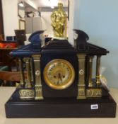A large 19th century black marble mantle clock 53cm mounted with a gilt figure (Lorenzo Medici) with