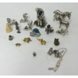 Collection of miniature metal objects and ornaments