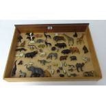 An antique collection of lead zoo animals.