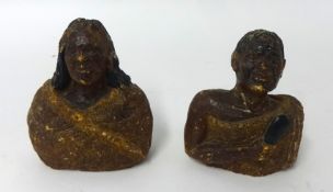 Two Kauri gum carved heads a Maori man and women, height 14cm.