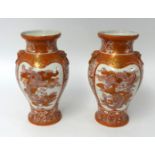 A pair of Japanese porcelain 'Kutani' vases.