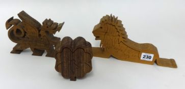 Three carved wood 3D model puzzles