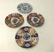 A pair of early 20th century Imari patterned plates and 2 other porcelain plates (4)