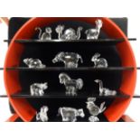 Swarovski Crystal glass The Chinese Zodiac collection and stand (red and black.) Dog, Dragon,