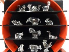 Swarovski Crystal glass The Chinese Zodiac collection and stand (red and black.) Dog, Dragon,