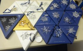 Swarovski Crystal glass Christmas tree decorations, approx. 18 pieces. Snowflakes, various designs.