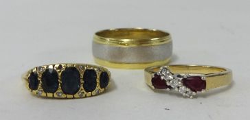 Three dress rings including 14K band ring, an a 18ct and 9ct ring (3)