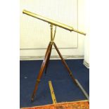 Antique brass 3 inch telescope by Davis of London, mounted on an adjustable mahogany tripod stand