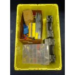 A large collection of mixed Meccano parts including plates, strips, girders, brackets, screws,