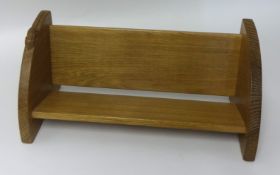 A Robert Mouseman Thompson oak book trough, with carved mouse signature. 15 cm high.