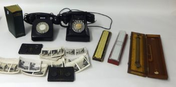 Two black old telephones also some drawing instruments, viewers and photographic cards etc