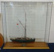A scale of ship 'The Ranger' in glazed cabinet.