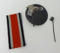 A German Blockade Runner Badge and pin.