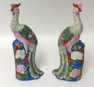 A pair of 20th century Phoenix Birds of Chinese design, height 32cm.