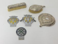 A silver back brush set and various car badges RAC, AA and Argyle Supporters.