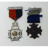 Two nursing medals awarded to J.C.BUTLER circa 1930 including silver and enamelled