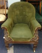 An early Victorian armchair with rosewood frame.
