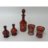 Bohemian glass small decanter, pair of goblets, pair of scent bottles