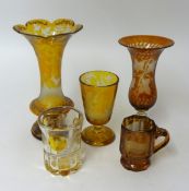 Five yellow Bohemian glass items