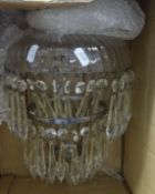An old glass chandelier light fitting