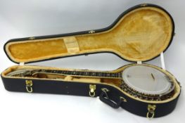 A Clifford Essex Paragon Concert Banjo No114 with case. Once owned by Arthur Thomas who played