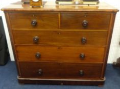 A Victorian mahogany chest fitted with two short and three long drawers.