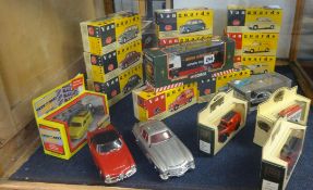 A collection of diecast models including 11 Vanguard 1.43 scale models, 3 Days Gone, Eddie