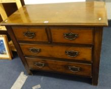 A walnut veneered chest of drawers also a mahogany framed wall mirror.