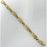 A 9ct yellow gold bracelet, Celtic type links, large Lobster clasp, approx 37.80g, 21cm x 1cm