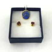 A pair of 18ct yellow gold heart shaped ruby stud earrings, an Australian lightning ridge Opal