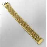 A 14K yellow gold bracelet, bracelet is a fine mesh design, 49.30g, 19 x 2cm.