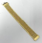 A 14K yellow gold bracelet, bracelet is a fine mesh design, 49.30g, 19 x 2cm.