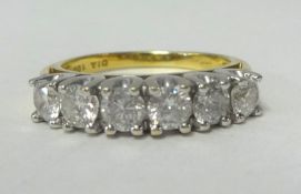 A six stone diamond set ring, approx 1ct, size MN