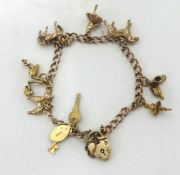 A 9ct gold charm bracelet, approx 22g.