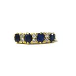 An 18ct antique sapphire and diamond ring, set with 4 blue sapphires and 8 bright old cut