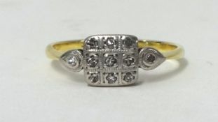 An 18ct diamond cluster set ring, comprising nine eight cut diamonds, total weight approx 0.16