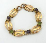 A 9ct gold bracelet set with five gem stones.