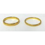 Two 22ct gold wedding bands, approx. 3g.