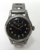Jaeger Le Coultre, a military wrist watch, with black dial.