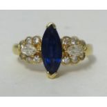 A 14k sapphire and diamond set ring, size J.