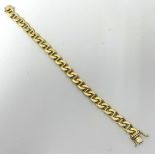 A 14K yellow gold bracelet, flat links, approx 42.30g, 20cm x 1cm.