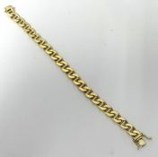 A 14K yellow gold bracelet, flat links, approx 42.30g, 20cm x 1cm.