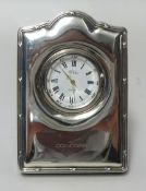 A Sterling silver Concord miniature clock, 9.50cm x 6.50cm.