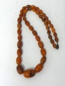 An amber style necklace.