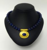 A modern Egyptian gold & lapis lazuli necklace, length 45cm.