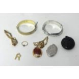 Various jewellery including a silver bangle, a gilt bangle, gold and other items.