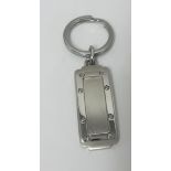 Cartier, a Santos watch key ring, boxed.
